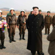 Image for article titled Kim Jong Un Visits Female Fighter Pilots, Picks Up Camera For Photo Op